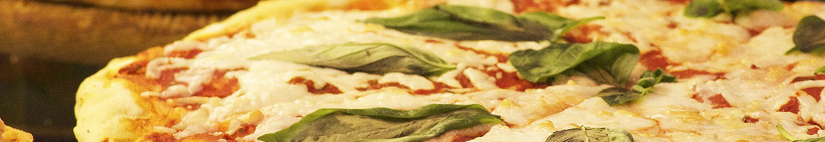 Eating Italian Pizza at Vesuvio Restaurant restaurant in Carmel-By-The-Sea, CA.